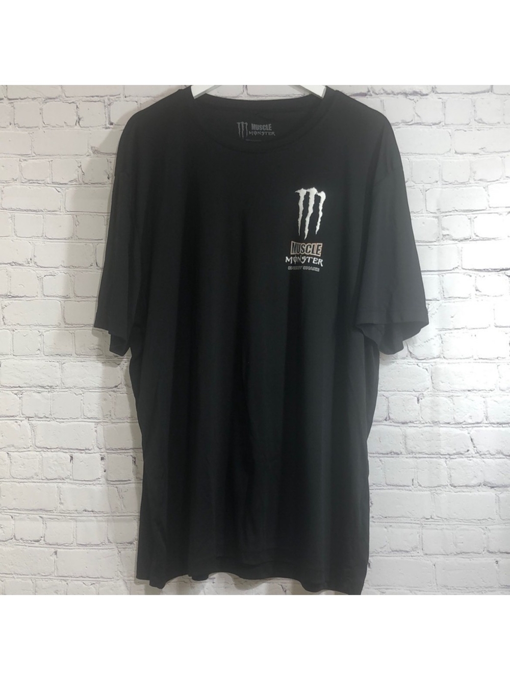 Muscle Monster Men's Black Short Sleeve Performance Tee - Logo Print